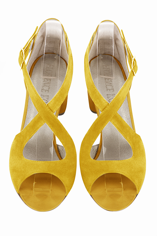 Yellow women's closed back sandals, with crossed straps. Round toe. Low flare heels. Top view - Florence KOOIJMAN